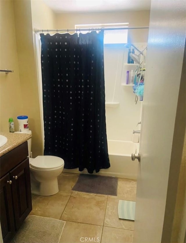 full bathroom featuring tile patterned flooring, vanity, shower / bath combination with curtain, and toilet