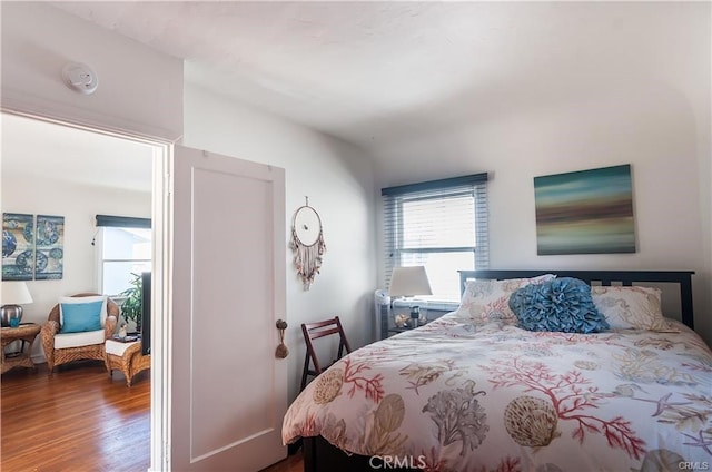 bedroom featuring wood-type flooring