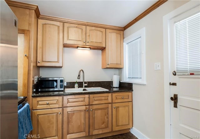 259 28th St, Hermosa Beach, CA 90254 - kitchen with a sink, stainless steel microwave, and dark stone counters