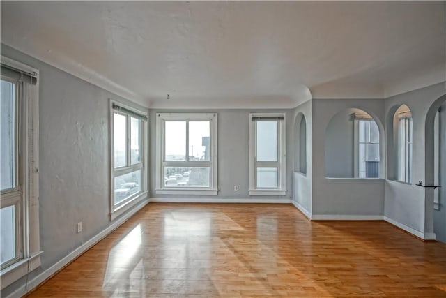 unfurnished room featuring light hardwood / wood-style flooring