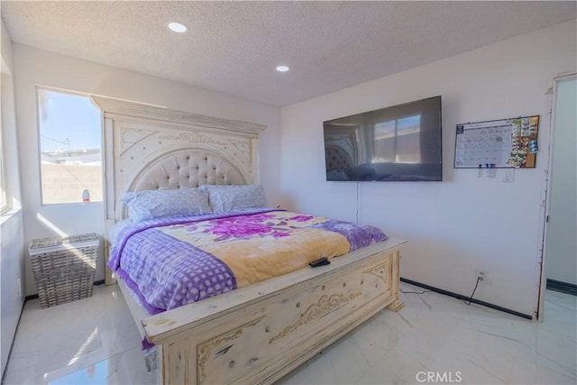 bedroom with a textured ceiling