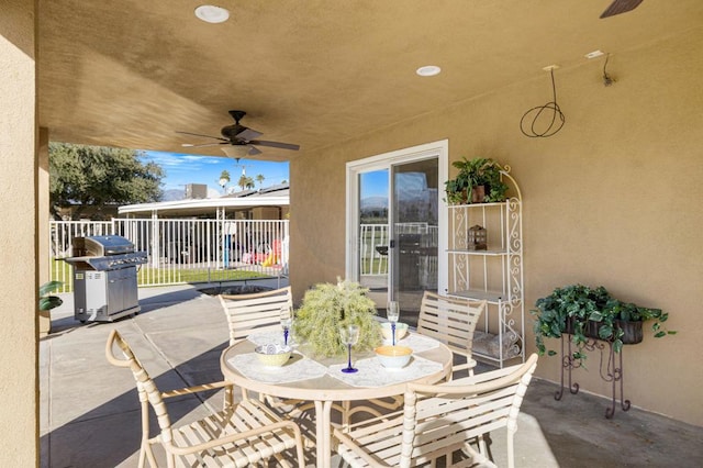 view of patio / terrace with a grill and ceiling fan