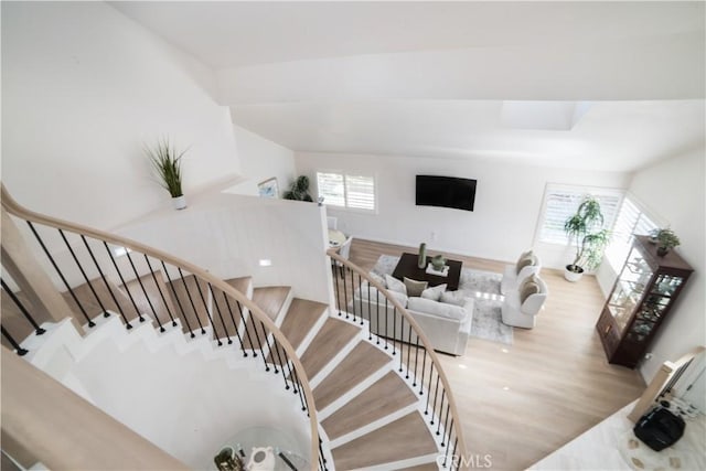 stairway featuring hardwood / wood-style flooring