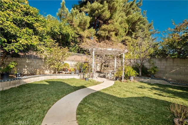 view of yard with a pergola