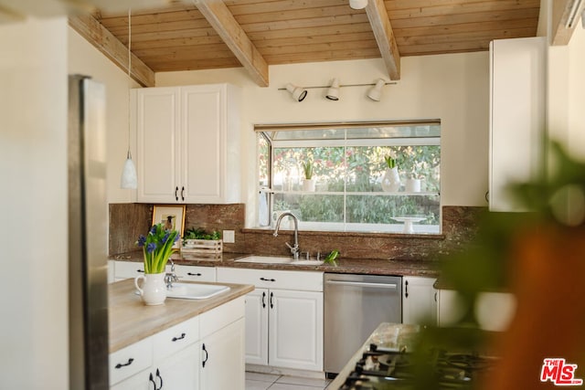 kitchen with sink, wood ceiling, white cabinetry, stainless steel appliances, and beamed ceiling