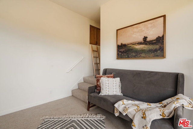 living area with carpet flooring