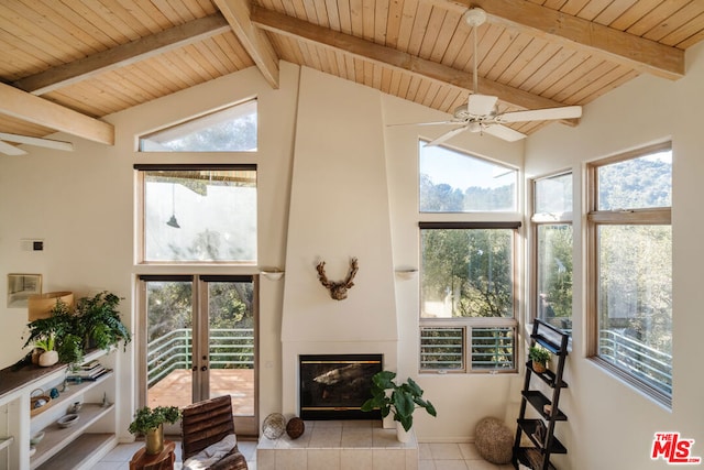 tiled living room featuring ceiling fan, high vaulted ceiling, wooden ceiling, and beam ceiling