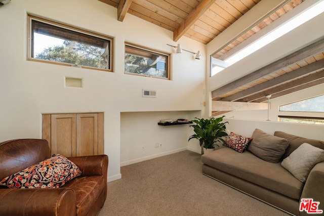 carpeted living room with beamed ceiling, wooden ceiling, and high vaulted ceiling