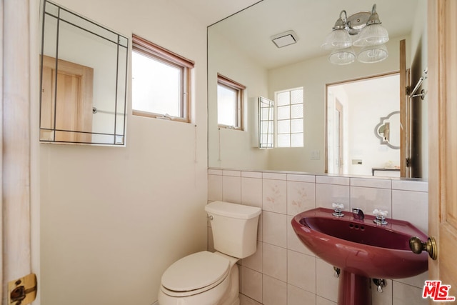 bathroom with sink and toilet