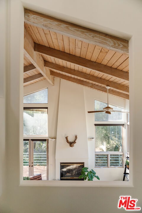 room details featuring beamed ceiling and wooden ceiling