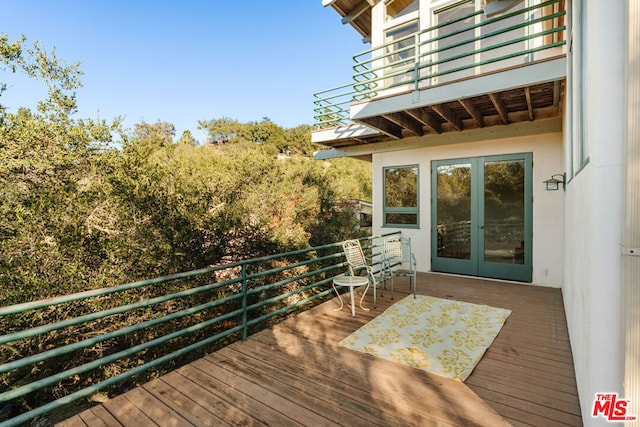 wooden terrace with french doors