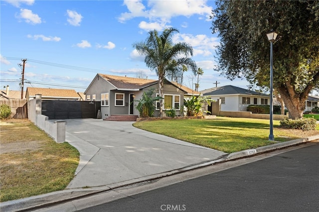 ranch-style house with a front lawn