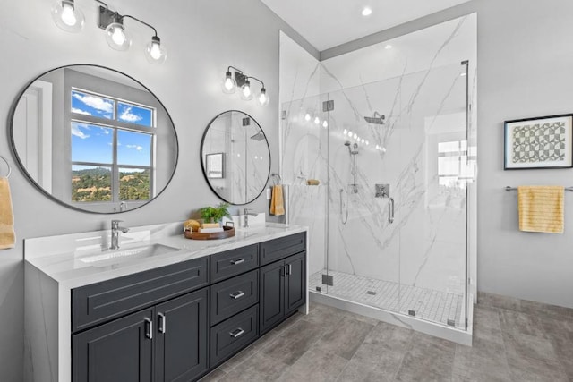 bathroom featuring vanity and a shower with shower door