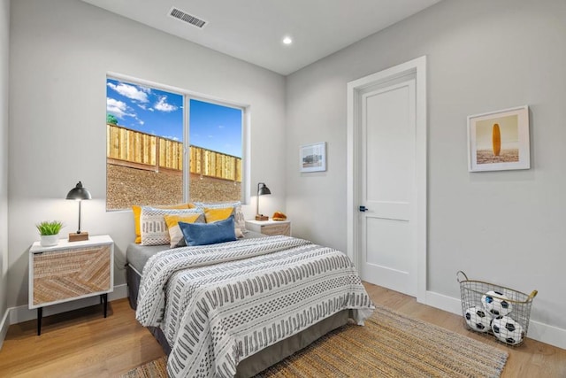 bedroom featuring hardwood / wood-style floors