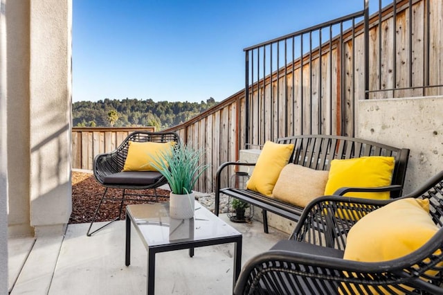 balcony featuring a patio area