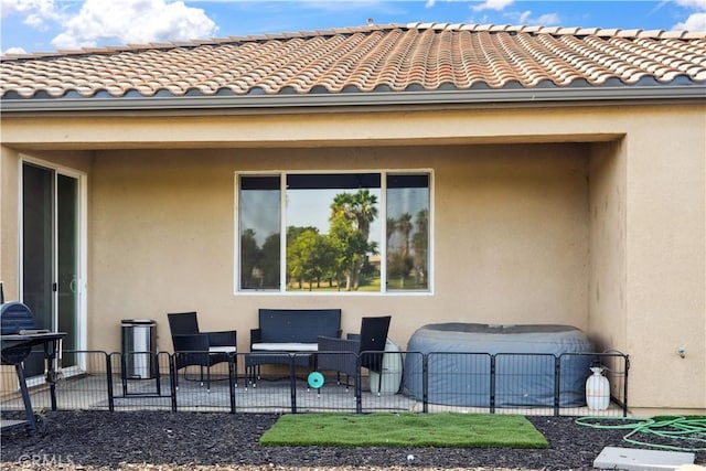 view of patio with a hot tub