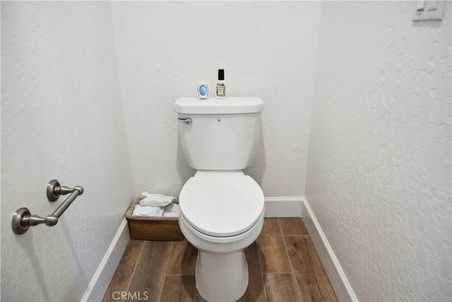 bathroom featuring toilet