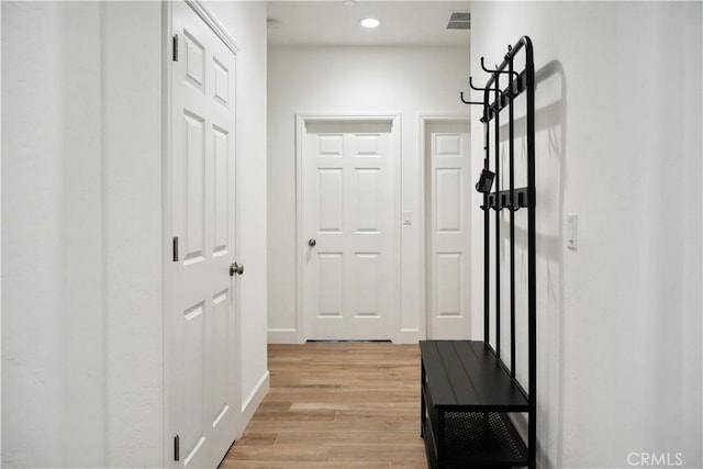 hallway featuring light wood-type flooring