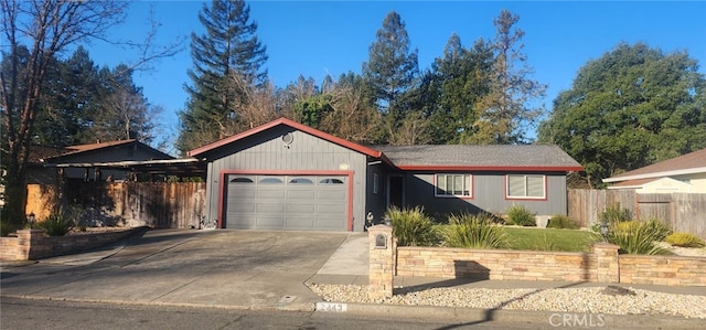 ranch-style home featuring a garage