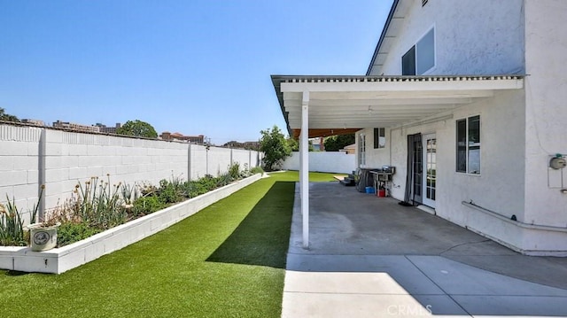 view of yard with a carport