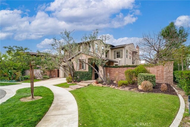 view of front of property with a front lawn