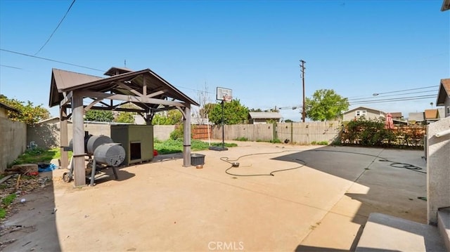 view of patio / terrace featuring a gazebo and a fenced backyard