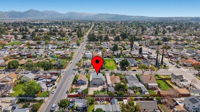 bird's eye view featuring a mountain view and a residential view