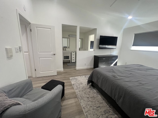 bedroom featuring hardwood / wood-style floors