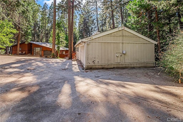 view of outbuilding featuring a garage