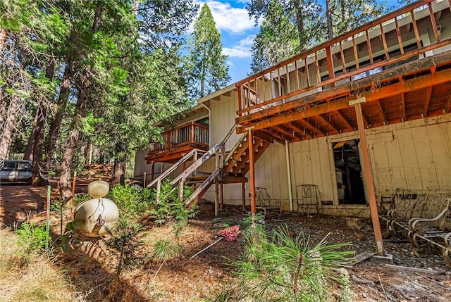 rear view of house with a deck