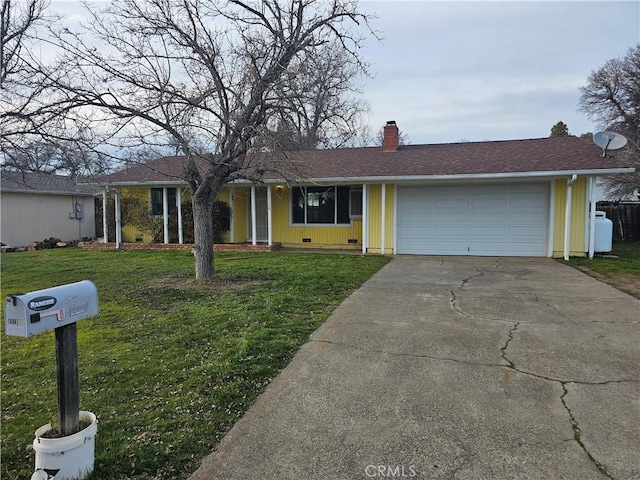 single story home with a garage and a front yard