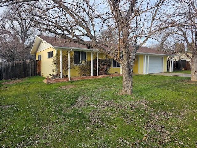 ranch-style house with a garage and a front yard