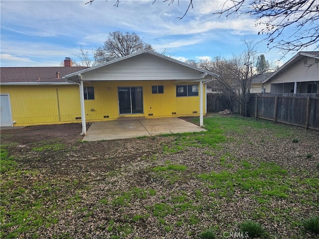 back of property featuring a patio area