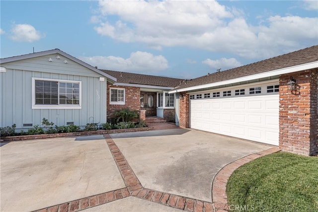 single story home with a garage