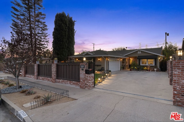 view of front of home with a garage