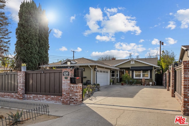 single story home with a garage