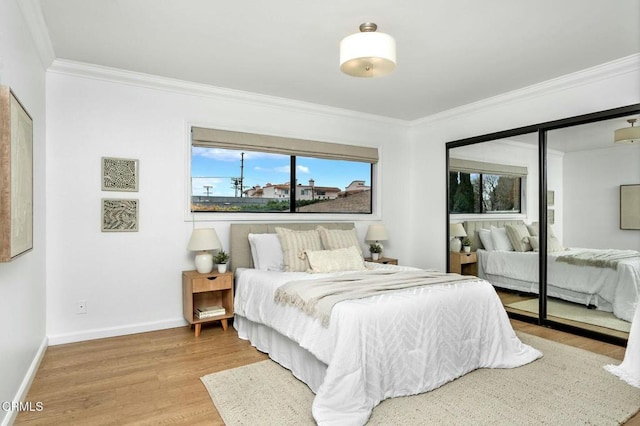 bedroom featuring wood-type flooring and ornamental molding