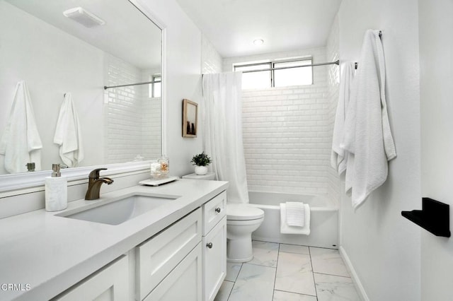 full bathroom with shower / bath combination with curtain, vanity, and toilet