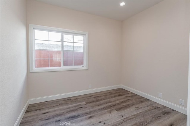 empty room featuring light hardwood / wood-style floors