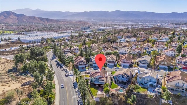 drone / aerial view featuring a mountain view