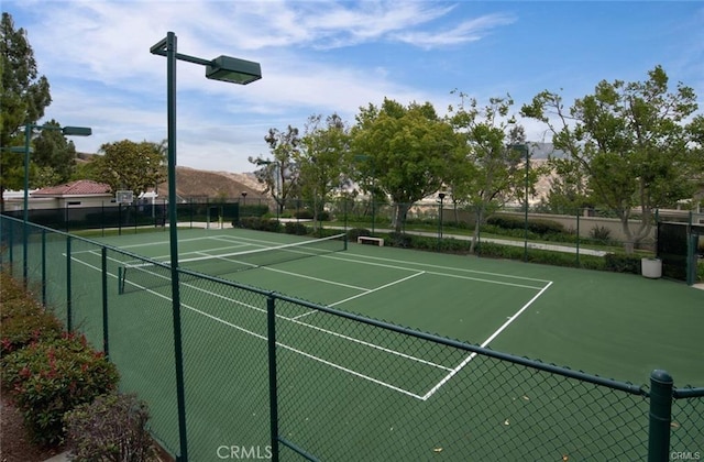 view of sport court featuring a mountain view