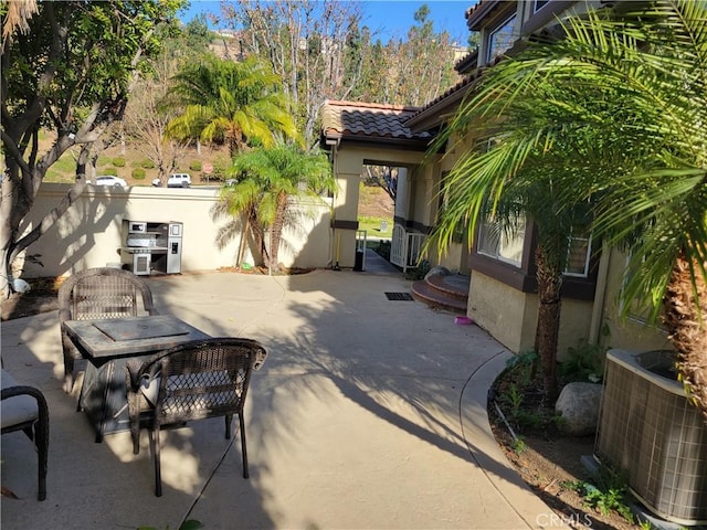 view of patio featuring central AC unit