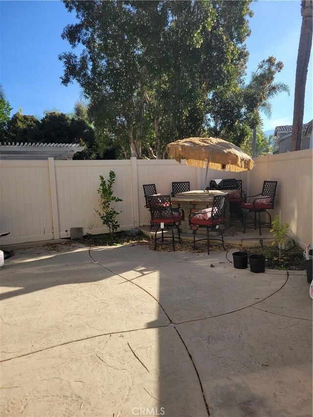 view of patio featuring a bar