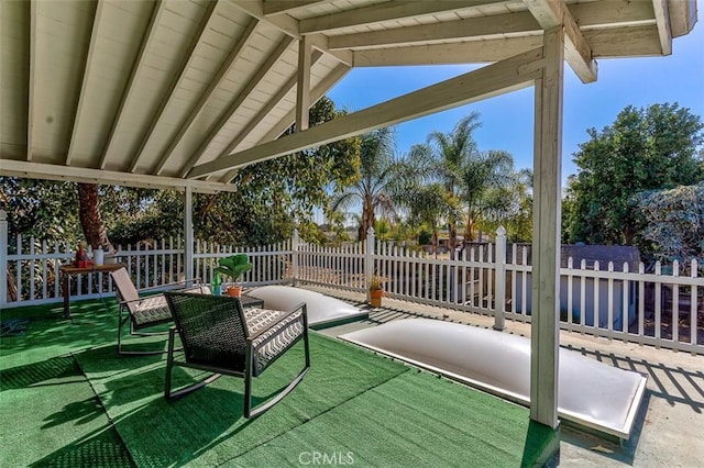 wooden deck with fence, a patio, and a yard