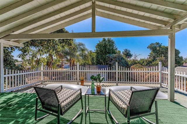 view of patio / terrace featuring fence and an outdoor hangout area