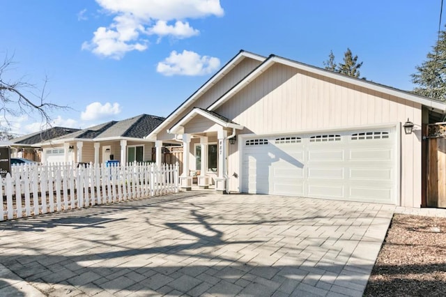 view of front of property featuring a garage