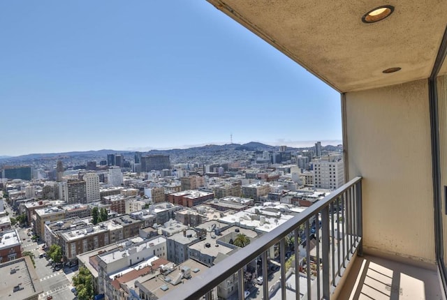 balcony featuring a mountain view