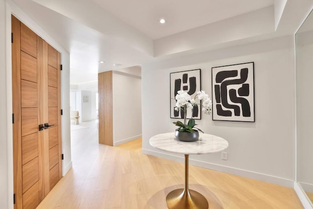 corridor featuring hardwood / wood-style flooring