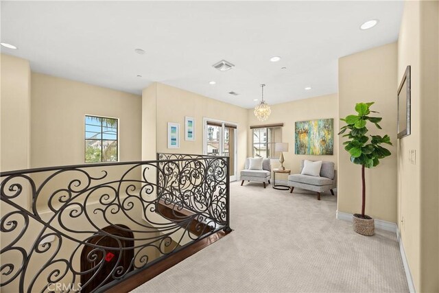 518 W Bencamp St, San Gabriel, CA 91776 - hall with carpet floors, baseboards, a chandelier, recessed lighting, and an upstairs landing