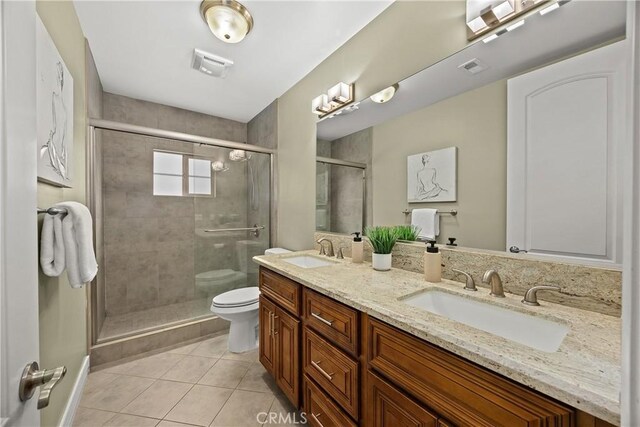 518 W Bencamp St, San Gabriel, CA 91776 - full bathroom featuring tile patterned floors, double vanity, and a shower stall
